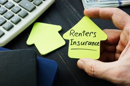 Renters insurance sign on the house shaped sheet.の写真素材