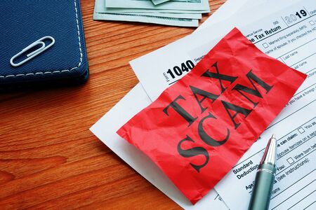 IRS tax scam phrase and empty forms.の写真素材