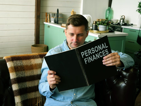 Man reads book about personal finances. Financial literacy concept.