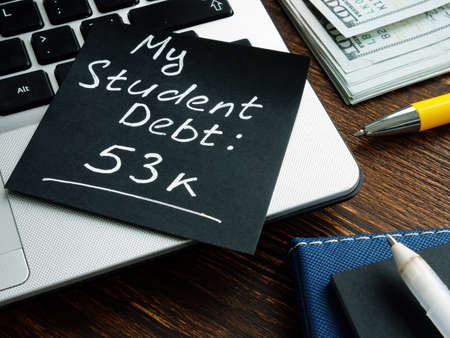 Black memo stick with My student debt words.の写真素材