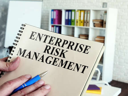 Enterprise risk management ERM. The documents are in the hands of the manager.の写真素材