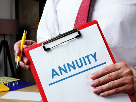 Info about Annuity and the manager offers to sign the documents.の写真素材