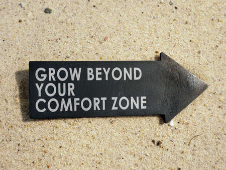 Grow beyond your comfort zone sign on the arrow.の写真素材