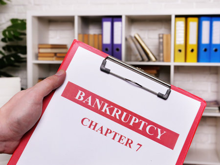 Bankruptcy chapter 7. The manager holds the sheets.の写真素材