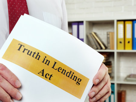 The man shows the Truth in Lending Act TILA.の写真素材
