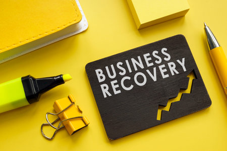 Business Recovery concept. Notepad, pen and marker.