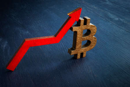 Rise of bitcoin price. BTC and arrow.の写真素材