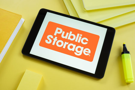 KYIV, UKRAINE - June 30, 2021. Public Storage logo on the screen of tablet. Editorial.のeditorial素材