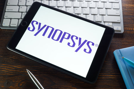 KYIV, UKRAINE - August 21, 2021. Synopsys Inc logo on the tablet and keyboard.のeditorial素材