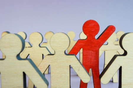 Leadership and initiative. The employee figurine stands out from the crowd.の写真素材