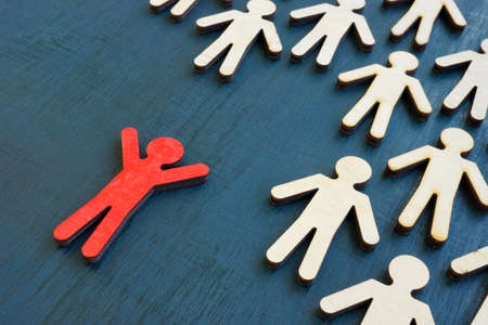 A unique figurine stay out from the crowd. Be active and initiative.の写真素材