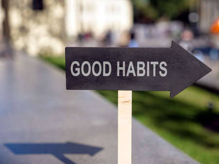 Black directional arrow with the inscription Good Habits.の写真素材