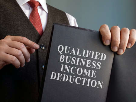 Manager shows Qualified Business Income Deduction QBI data.の写真素材