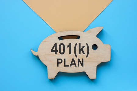 Piggy bank with words 401k plan for retirement.の写真素材