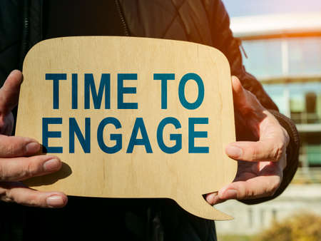 Time to engage phrase on the small poster.の写真素材
