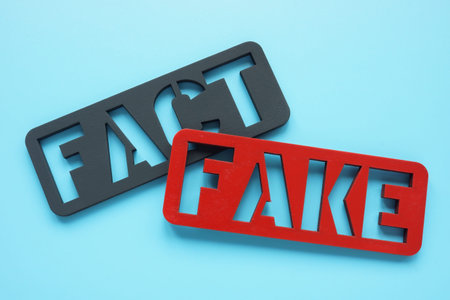 Plates Fact and Fake. Fake news concept.