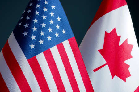 Close up of national flags USA and Canada.の写真素材