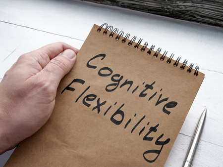 Man shows page with words cognitive flexibility.の写真素材