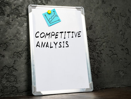 A whiteboard near the wall with words competitive analysis.の写真素材
