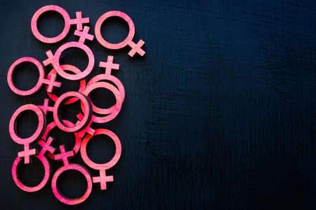Lot of female gender symbols and empty space.の写真素材