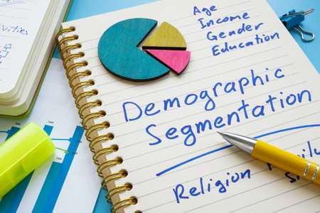 Demographic segmentation list on the page and papers.の写真素材