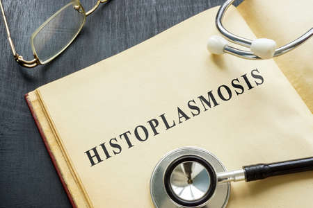 Book about Histoplasmosis disease and a stethoscope.の写真素材