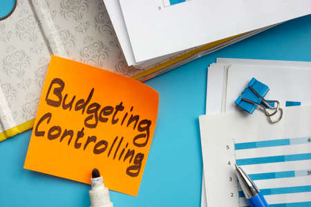 Open big folder and budgeting controlling sign.の写真素材