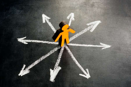 Figure and arrows in different directions. Analysis of Alternatives concept.の写真素材