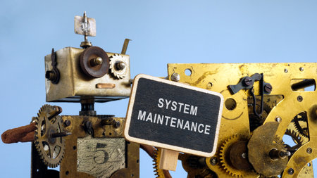 The robot near the mechanism holds a sign system maintenance.の写真素材