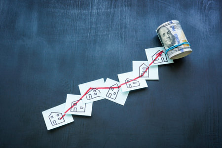 Real estate investing concept. Drawings of houses and a rising arrow.