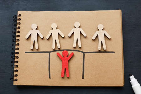 Servant leadership concept. Figures and one holds the bridge.の写真素材