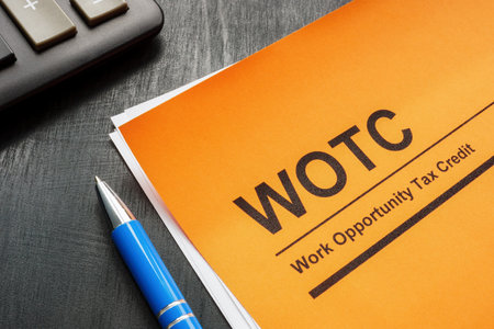 Work opportunity tax credit WOTC application, pen and notepad.の写真素材