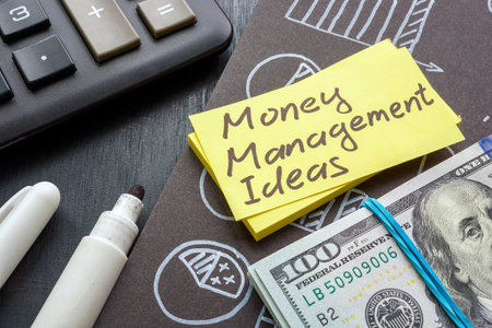 Money management ideas sign on the page with charts.の写真素材