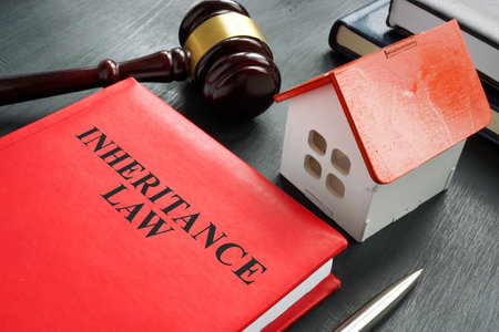 Inheritance law book, model of house and gavel.の写真素材