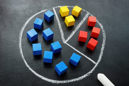 Customer segmentation concept. Chalk drawn diagram and cubes.