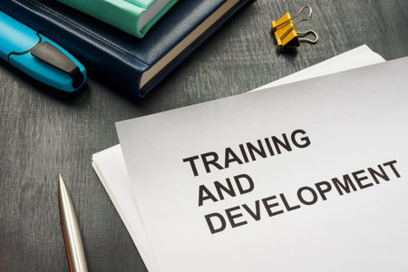 Papers about Training and development on the desk.