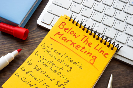 Marks about Below the line BTL marketing in the yellow notepad.の写真素材