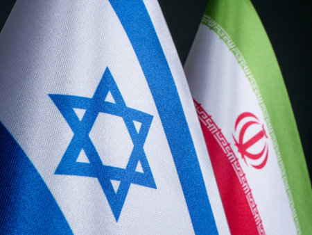 Flags of Israel and Iran, conflict between countries.の写真素材