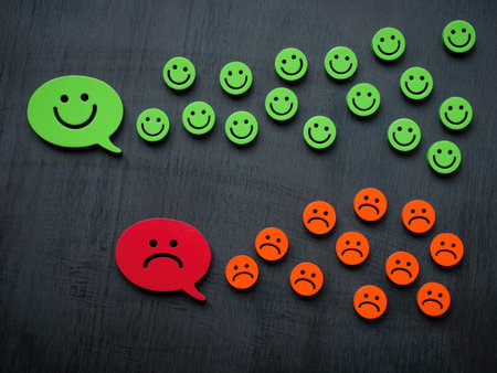 Positive and negative thoughts concept. Happy and unhappy emoticons.の写真素材