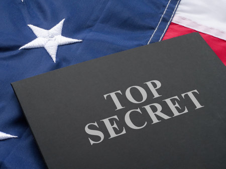 US flag and a folder labeled Top Secret.の写真素材