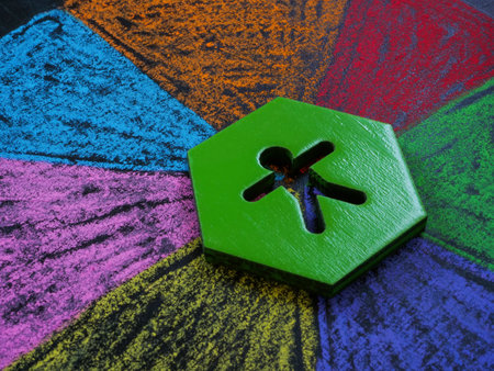 Intersectionality concept. The figurine lies on multi-colored segments.の写真素材