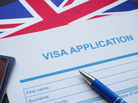 Empty Visa application and flag of the Great Britain.の写真素材