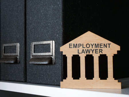 Shelf with documents and sign Employment lawyer.の写真素材