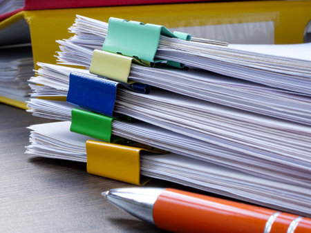 Stacks of papers for document flow, reporting in accounting and audit.の写真素材