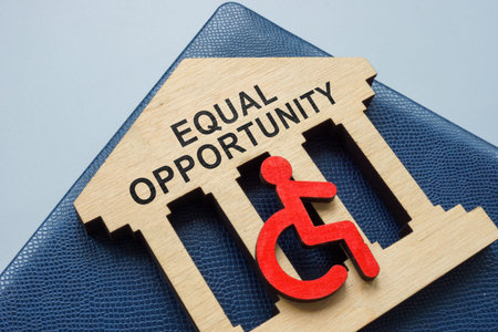 Plate with inscription equal opportunity and disabled person sign.