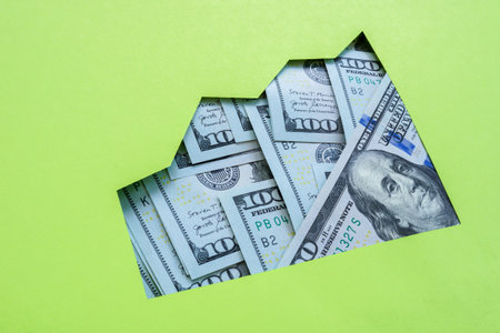 A growing graph of money as a symbol of savings and income growth.の写真素材