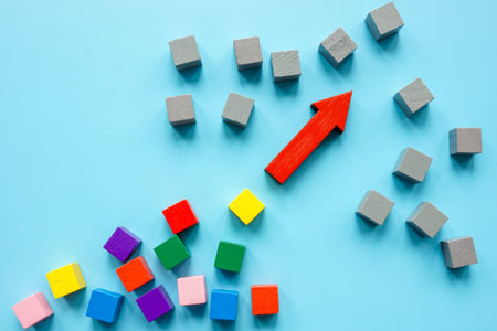 Gray cubes, multi-colored and arrow as a concept of diversity in society.
