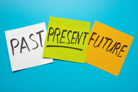 Three stickers with the words past, present and future.