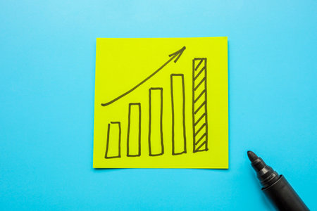 A drawn graph symbolizing growth, increased income, business success.の写真素材