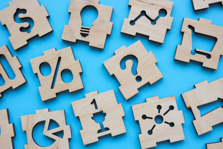 Abstract puzzle pieces about finance, business and marketing.